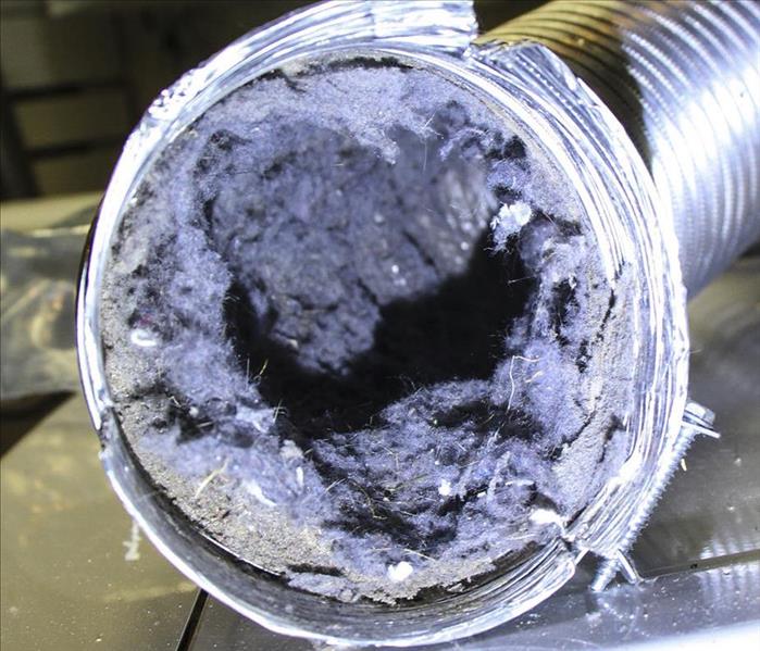 A dryer vent full of lint. 